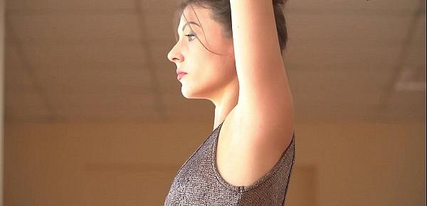  Super flexible Tonya making gymnasts positions before the camera.